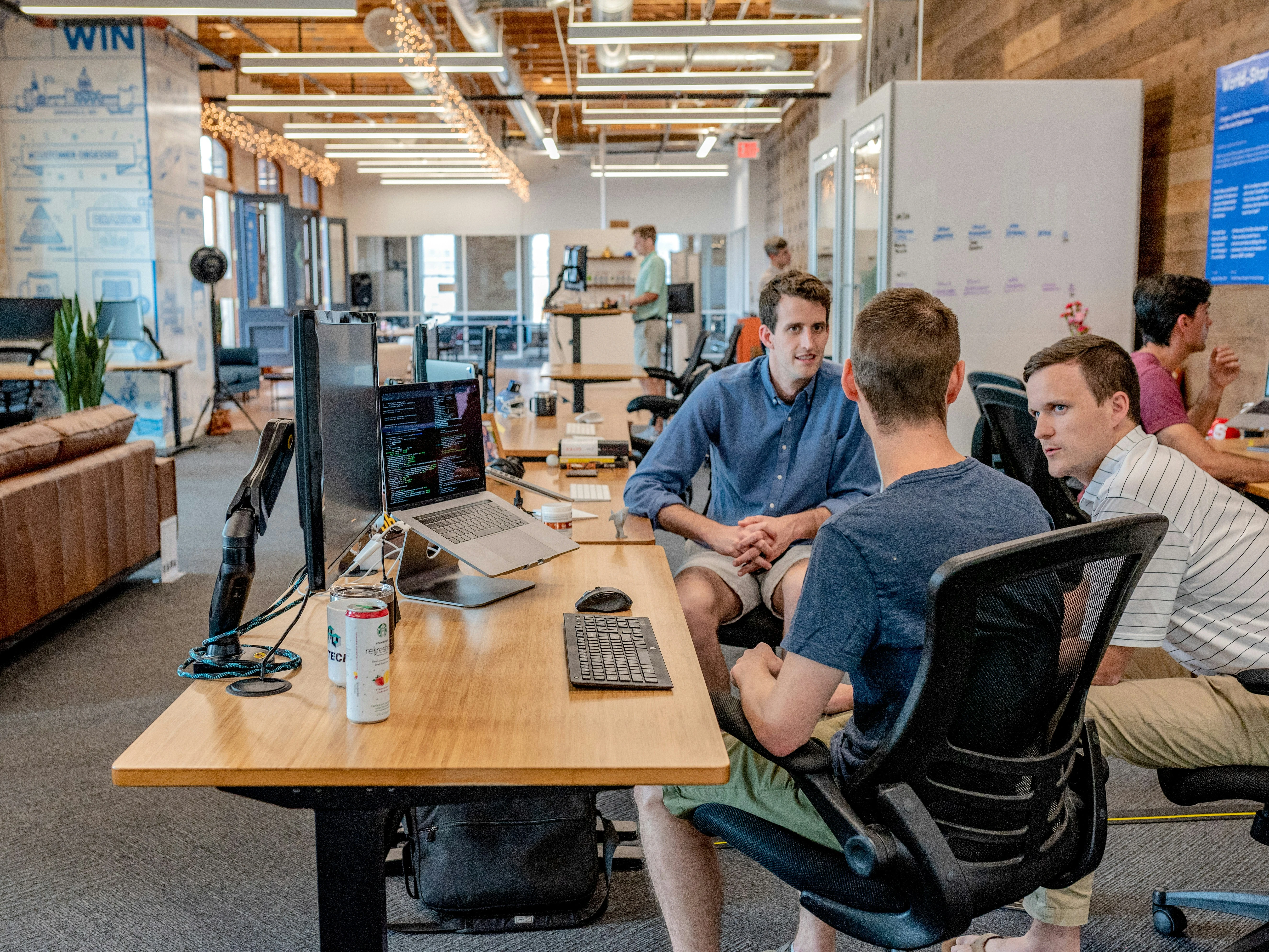 Team collaborating around a shared workspace